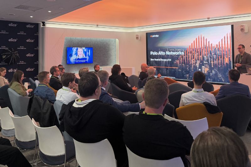 Attendees listening to a presentation at the Elisa Growth Breakfast event
